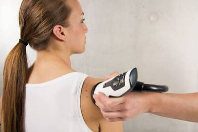 Focused shockwave therapy treatment for muscle and tendon pain at Peak Performance Sports Therapy